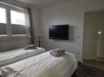 TV im Schlafzimmer Erdgeschoss - Fewo im Zentrum von Hahnenklee