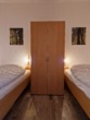 Schlafraum mitte mit zwei Einzelbetten - Appartement im Ferienpark Hahnenklee