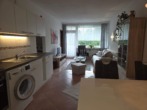 Wohnraum mit Küchenzeile - Appartement im Ferienpark Hahnenklee
