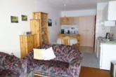 Wohnzimmer mit Essplatz - Appartement im Ferienpark Hahnenklee