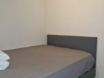 Schlafzimmer mit Fenster zur Loggia - Appartement im Ferienpark Hahnenklee