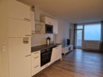 Wohnzimmer mit Küchenzeile - Appartement im Ferienpark Hahnenklee