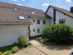 Hauseingangsseite - Geräumige 3-Zimmer-Eigentumswohnung
